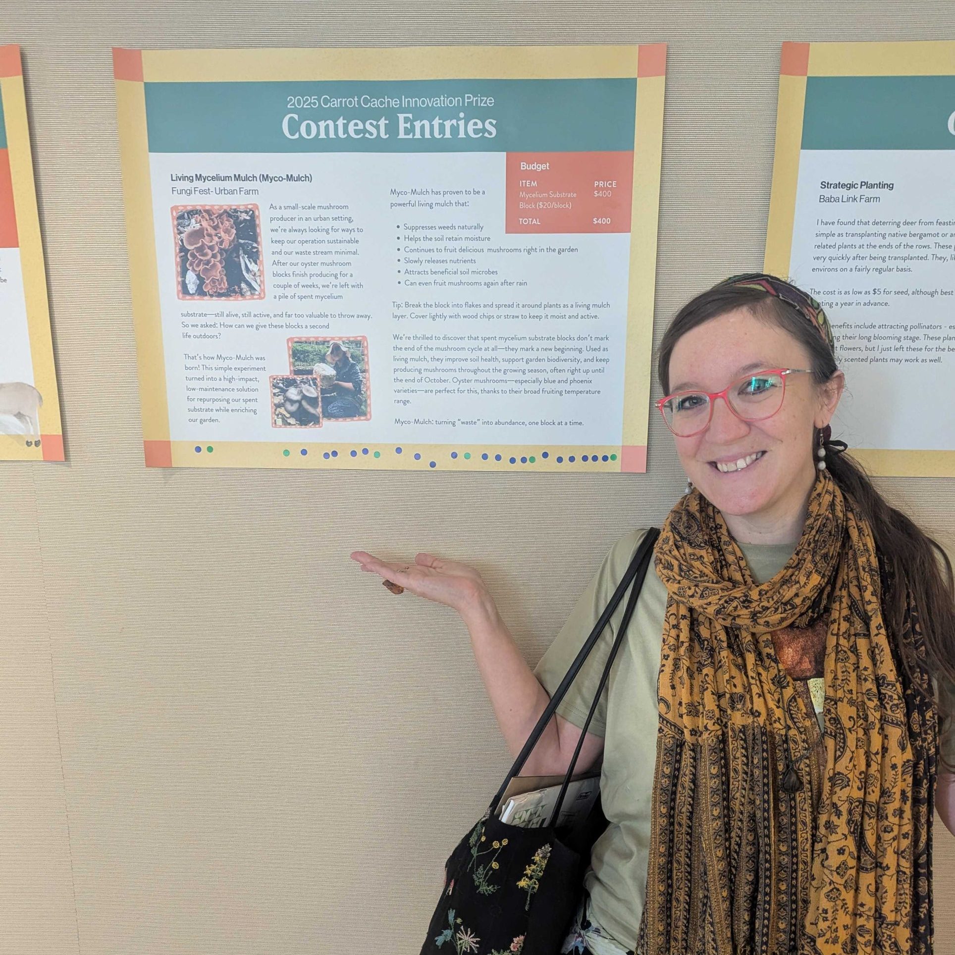Photo of Michelle, Carrot Cache Prize winner, pointing to a poster of her project at the EFAO 2025 Conference