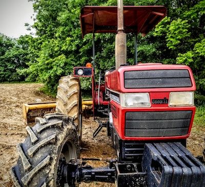 Tractor parked in field