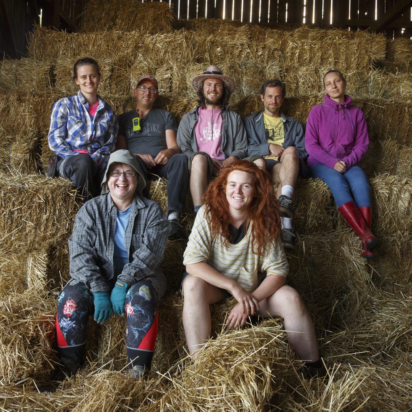 photo of smiling farmers sitting
