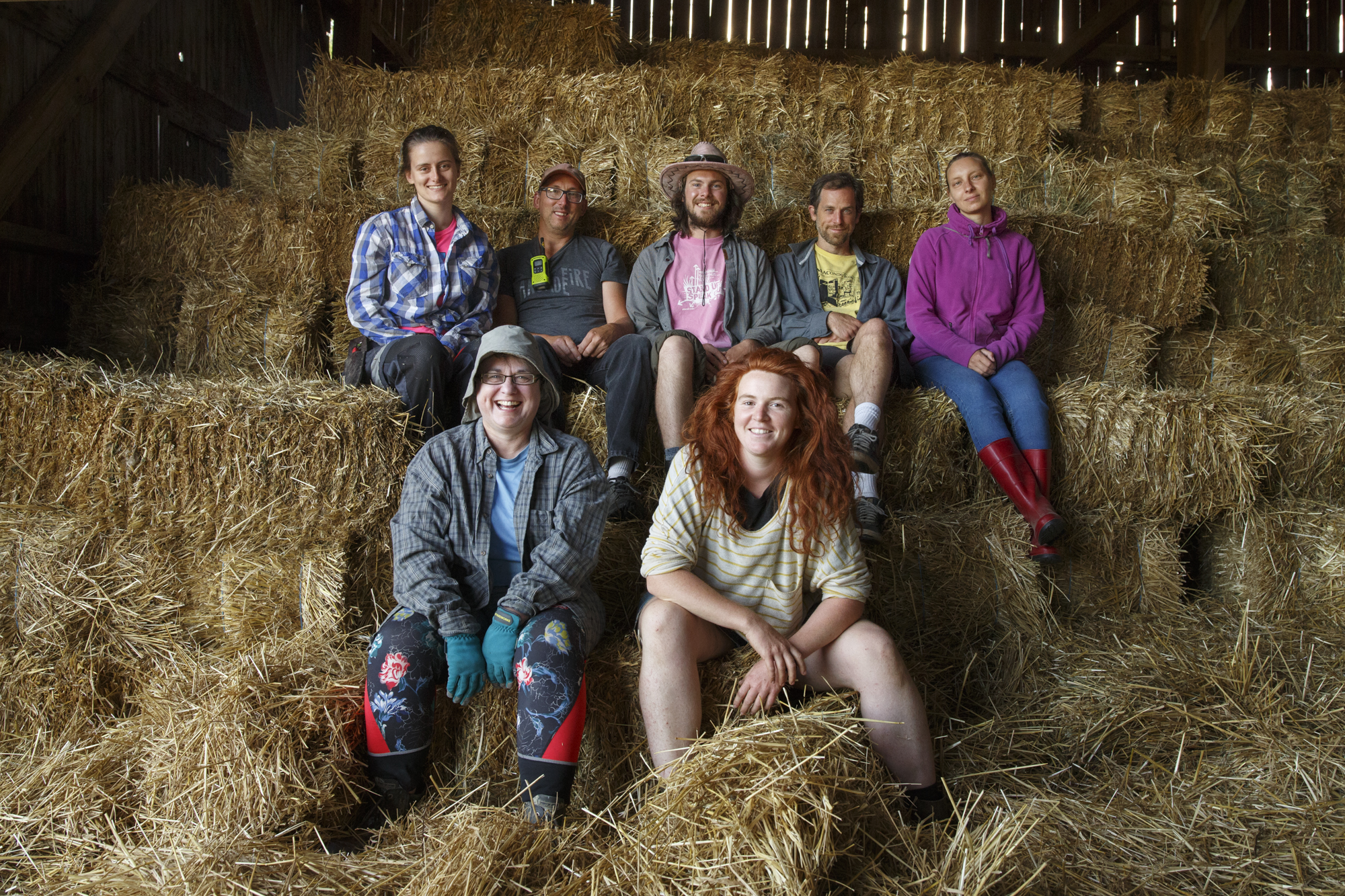 photo of smiling farmers sitting